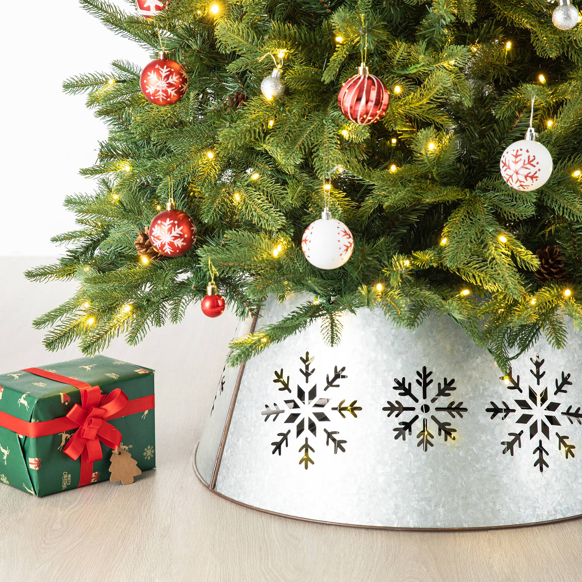 Glitzhome® Silver 26" LED Snowflake Cutout Metal Tree Collar